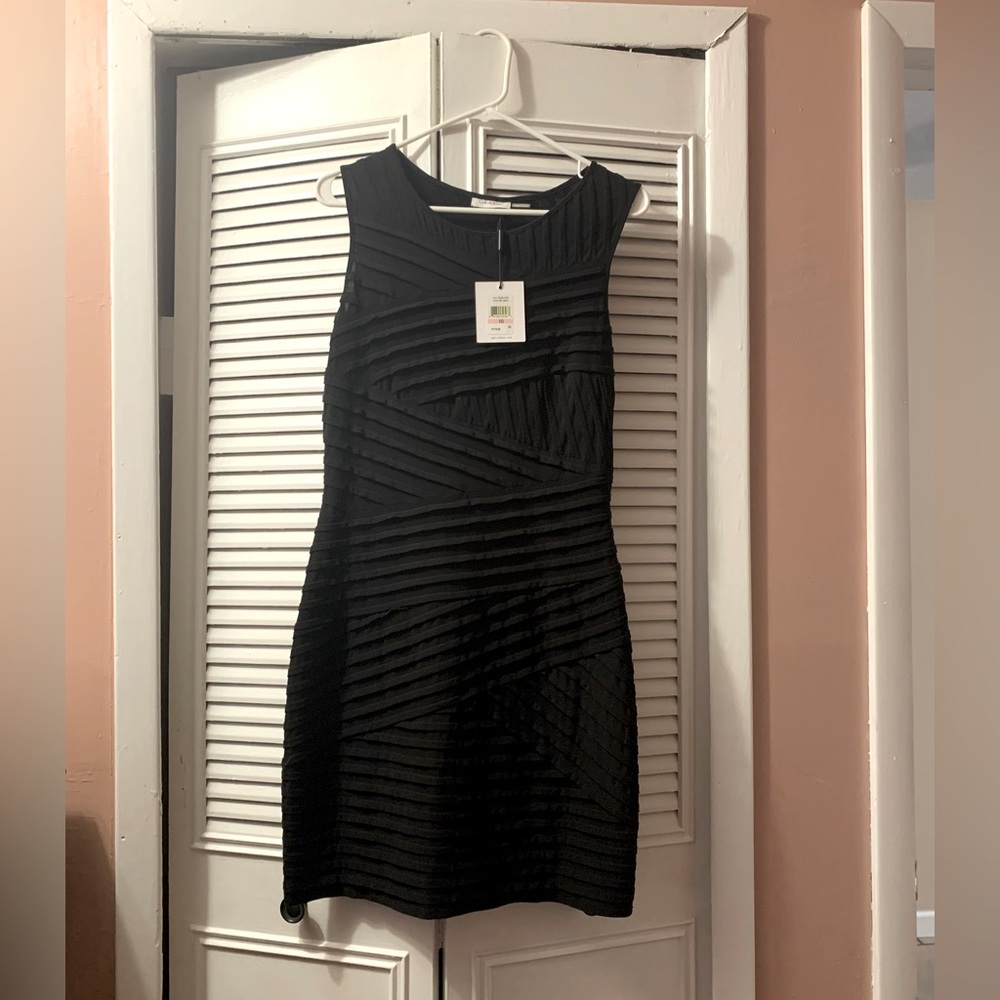 Black brand new Calvin Klein minidress, size 10